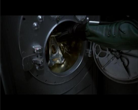 Benson pulls the emergency door release -